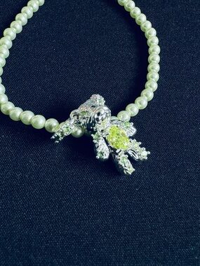 Green Pearl Beaded necklace with Silver bear Charm